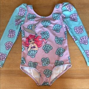 Disney Princess Swimsuit with Purple and Aqua Accents: Ariel and shells.